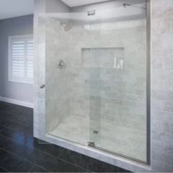 Basco Cantour 76" High x 54" Wide Pivot Frameless Shower Door with AquaGlideXP Clear Glass