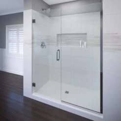 Basco Celesta 76" High x 47" Wide Pivot Frameless Shower Door with Clear Glass