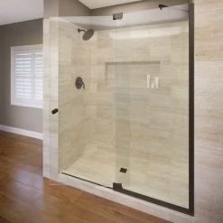 Basco Cantour 76" High x 42" Wide Pivot Frameless Shower Door with AquaGlideXP Clear Glass